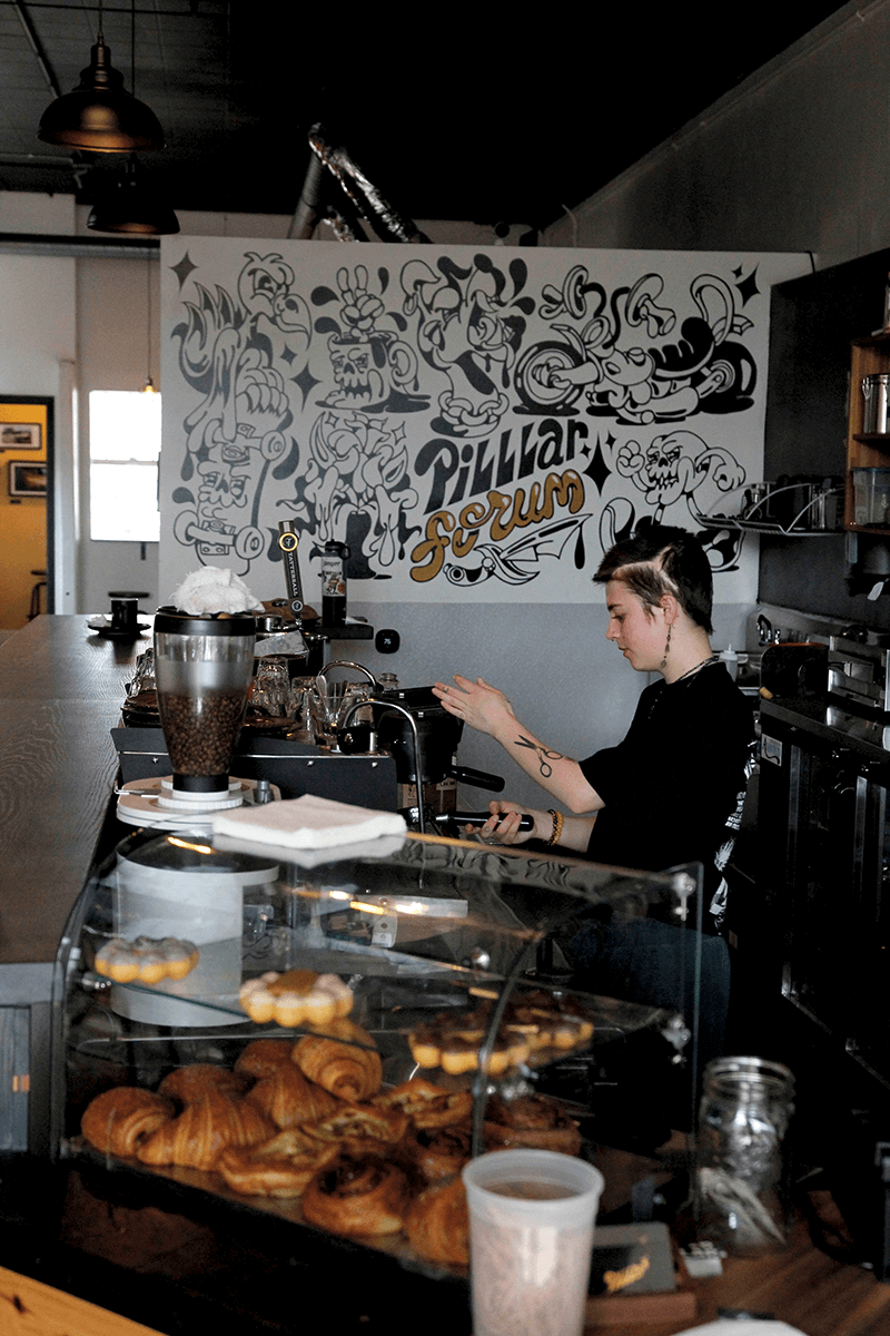 Barista Gabby Hopkins prepared a latte.